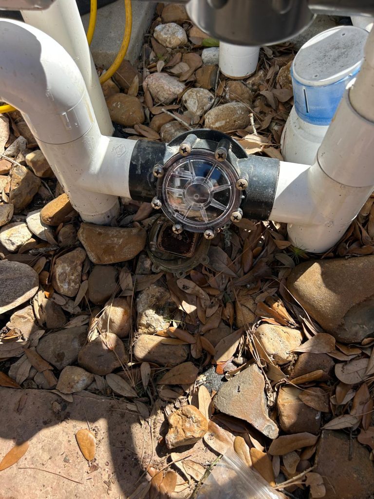 new pool check valve installed ensuring proper water flow and preventing backflow in pool plumbing