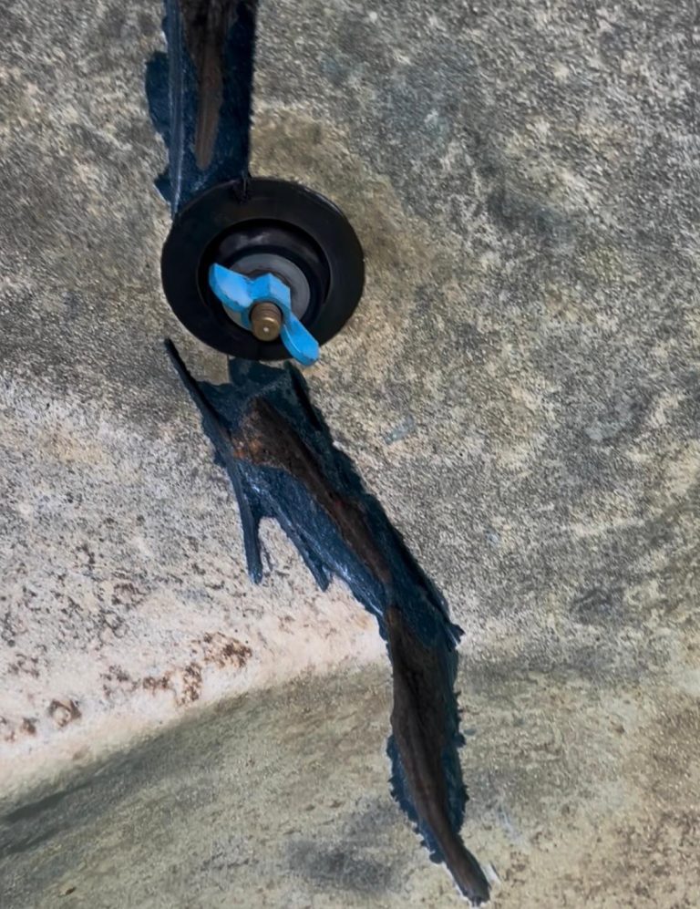pool crack leak before repair with visible crack near spa jet causing water loss
