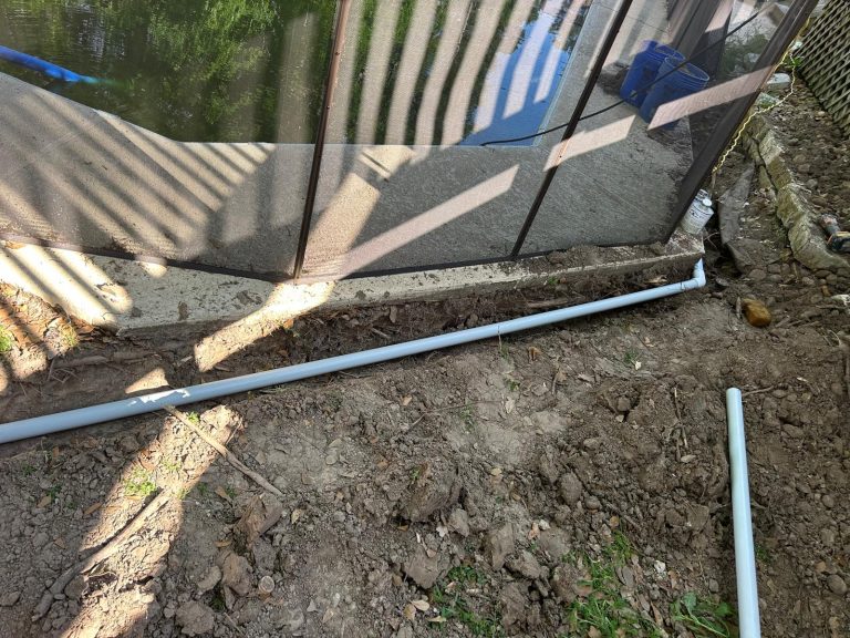 new pool return line replumbing with schedule 40 pvc pipe installed along pool deck trench for leak repair