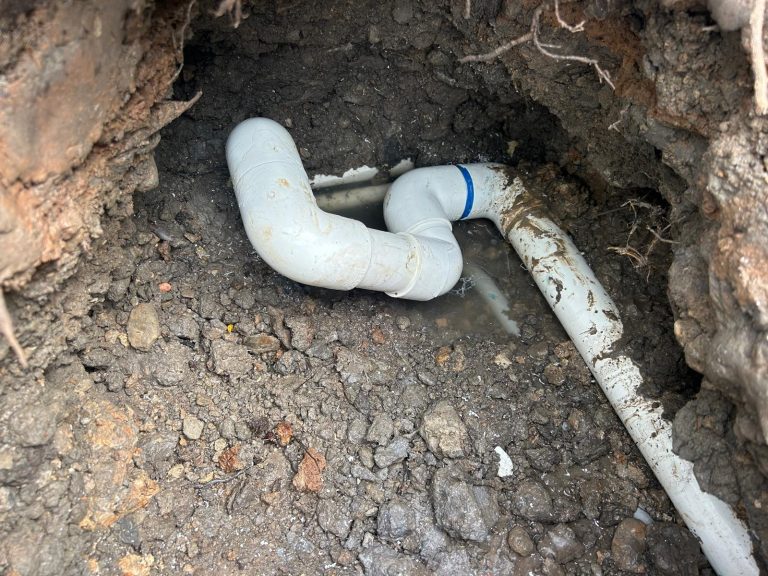 Repaired underground main drain PVC pipe after professional pool leak repair in Houston TX
